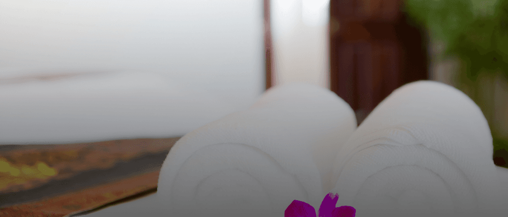 Spa ambiente with stones and flowers